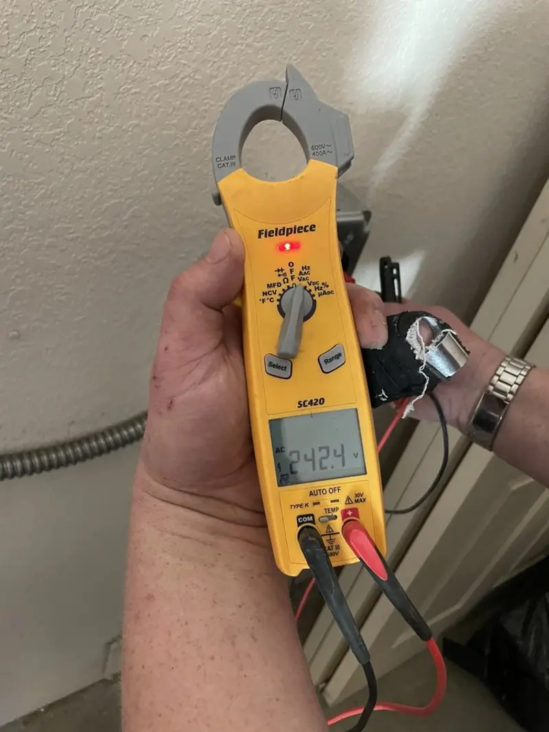 Voltage testing with clamp meter during Circuit Breaker Repair in Kingsport
